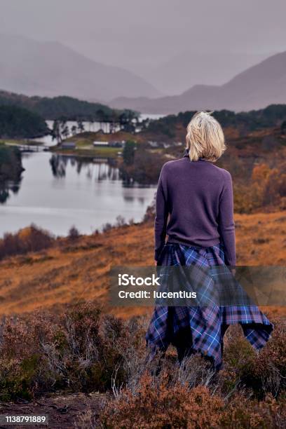 Woman In Glen Affric In The Scotland Highlands Stock Photo - Download Image Now - Glen Affric, Kilt, Scotland