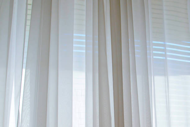 istock Background of the white cloth curtains on the window. 1138791952