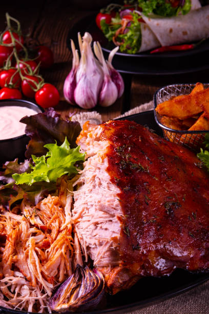 istock delicious pulled pork with baked potato quarters 1138796762