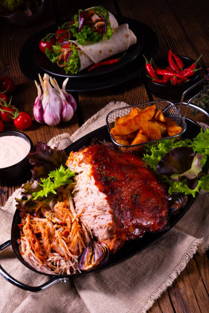 istock delicious pulled pork with baked potato quarters 1138796842