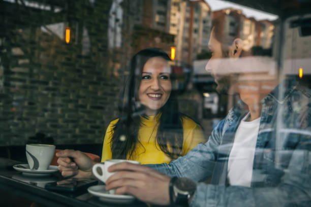 istock Young couple in a coffee shop 1138799936