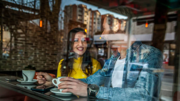 istock Young couple in a coffee shop 1138800145