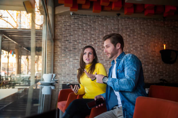 istock Young couple in a coffee shop 1138800172