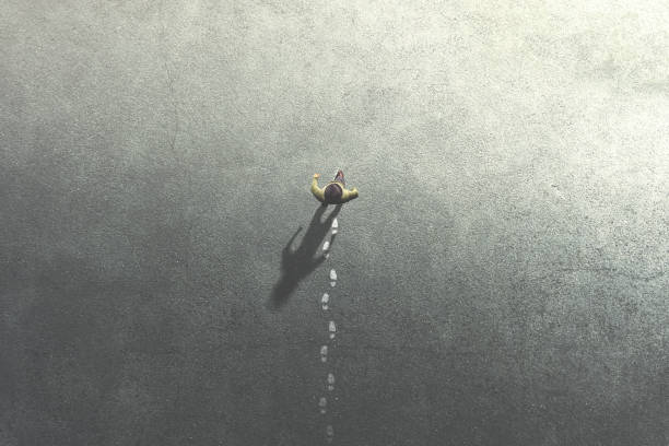 man walking in the streets leaving footsteps on the ground