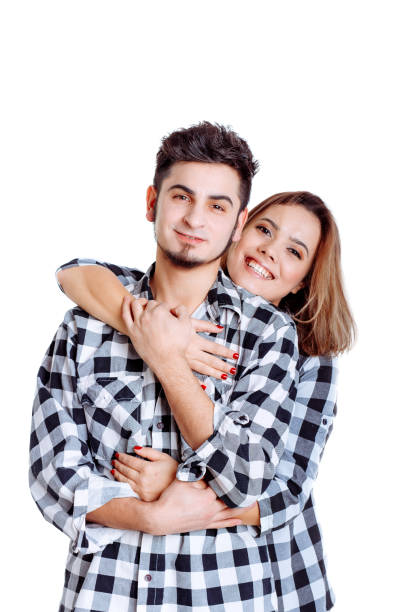 istock Portrait of happy couple isolated on white. 1138804364