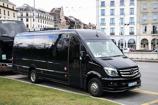 Geneva, Switzerland - March 13, 2019: Passenger van Mercedes-Benz Sprinter in the city street.
