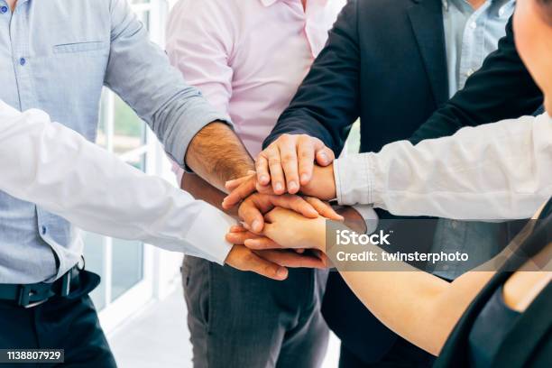 Business People Putting Hands Togehter For Unity Stock Photo - Download Image Now - Morality, Honesty, Teamwork