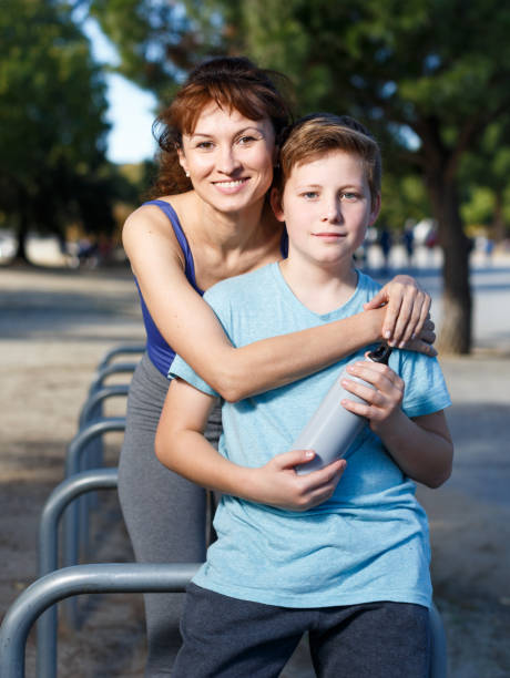 istock Family during break in outdoors workout 1138809218
