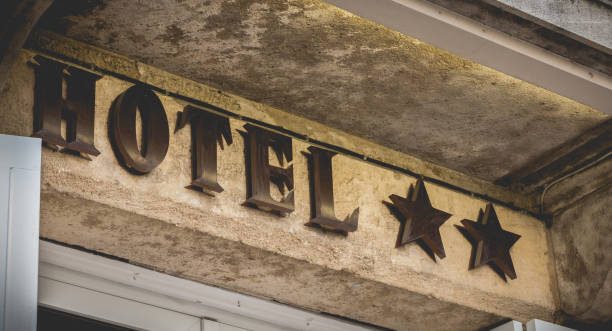 istock hotel sign on a stone wall with two stars 1138809930