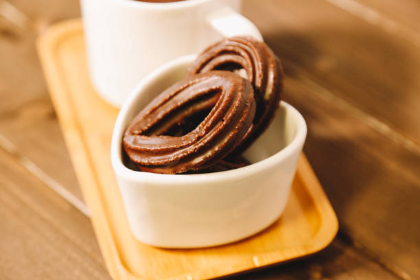 istock small spanish chocolate fritters served on a wooden table 1138810736