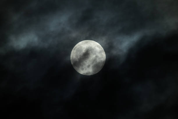 istock Full Moon and clouds on the night sky 1138812186