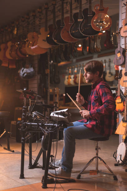 istock Young musician playing the drums 1138813644