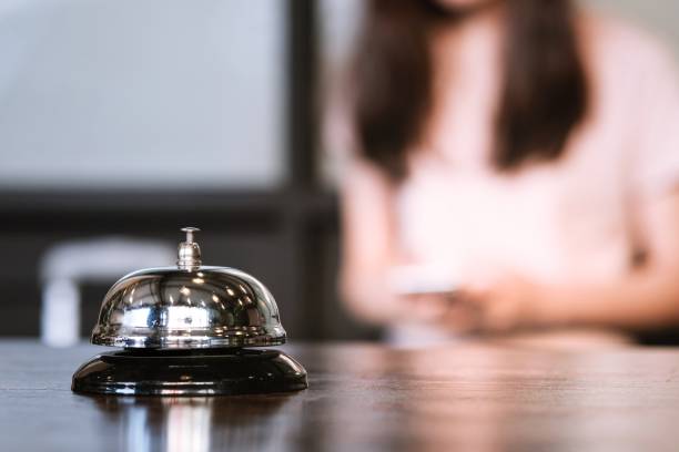 istock Hotel reception counter desk with service bell. 1138815903