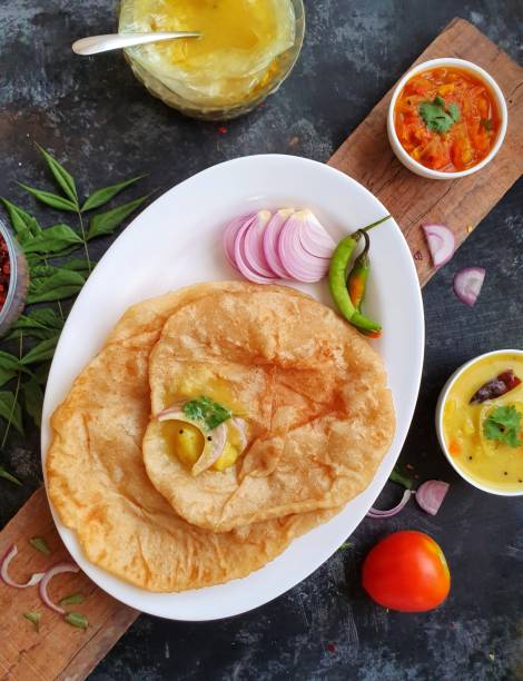 Poori masala Indian food Poori or roti made of wheat flour with potatoe masala curry is a popular breakfast dish in India masala stock pictures, royalty-free photos & images