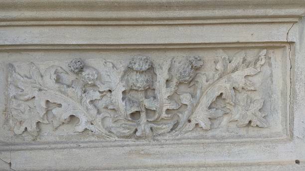 istock Thistle wall decor on an old building wall in Krasnodar. 1138822766