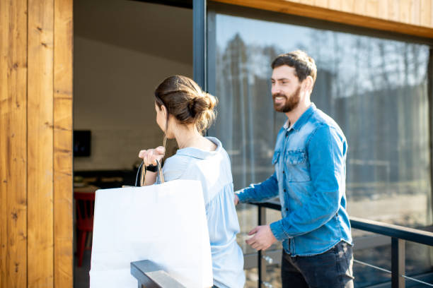 istock Couple entering home after the shopping 1138823089