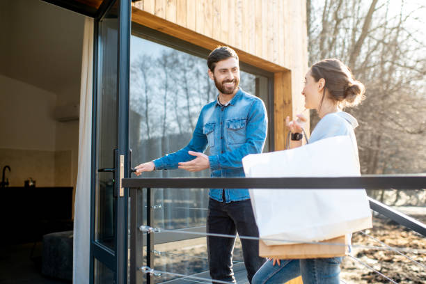 istock Couple entering home after the shopping 1138823090