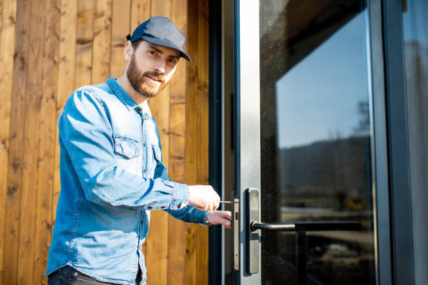 istock Man repairing door lock 1138823647