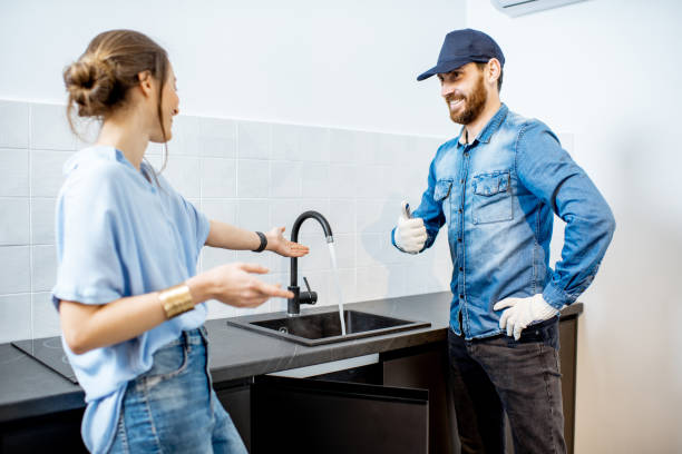 istock Handy man with woman on the kitchen 1138823776