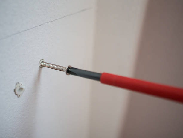 istock screwdriver tighten the screws 1138828129