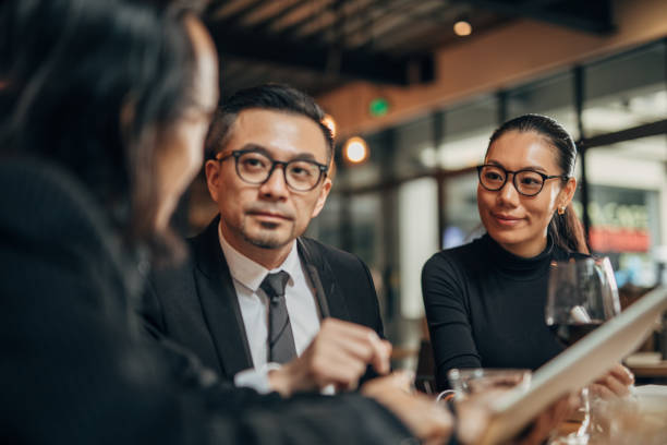 istock Modern people on business meeting in restaurant 1138828515