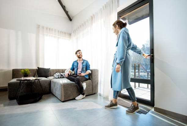 istock Woman coming home 1138831193