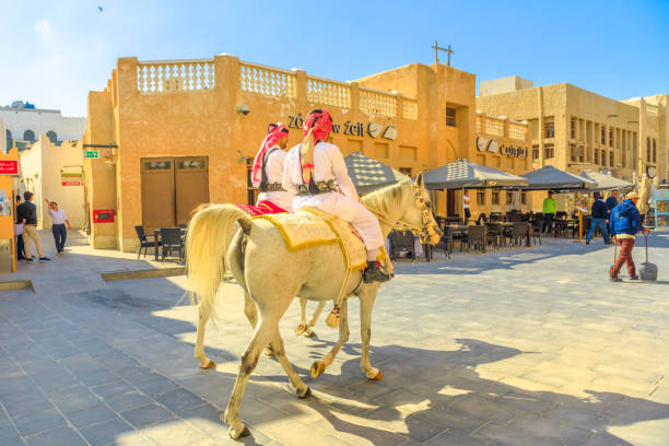 police on horse at souq waqif - horse arabian horse arabia white imagens e fotografias de stock