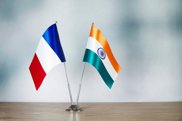 istock French and Indian flag standing on the table 1138833436