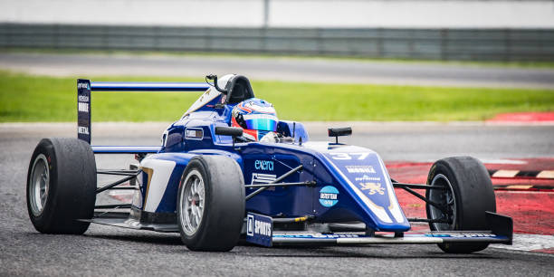 istock Blue formula race car on the track 1138834703