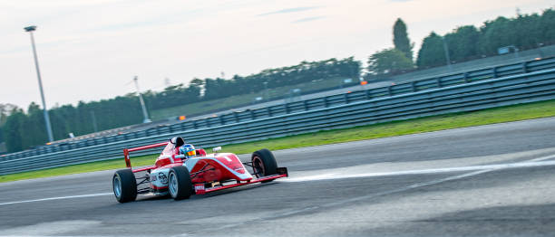 istock Formula race car going fast on the track 1138834711