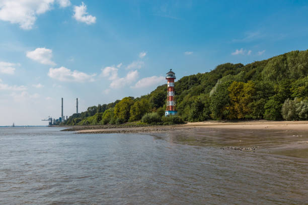 Beautiful lighthouse in Hamburg Lighthouse on the Elbe beach Rissener Ufer Hamburg elbe river stock pictures, royalty-free photos & images