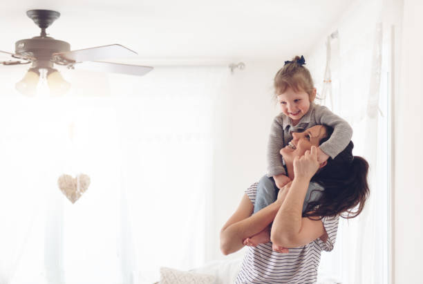 Mother and daughter spending a week-end morning together