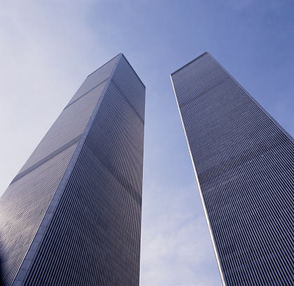 The World Trade Center Twin Towers in 1991 seen from the entrance and looking up seen in frog perspective, NYC, USA