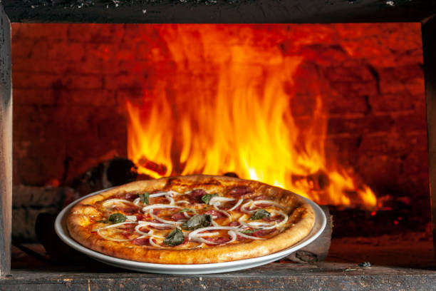 istock Baked pizza in the wood oven 1138844157