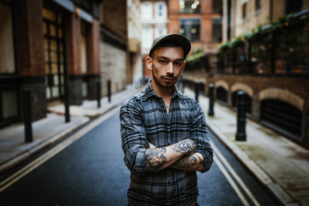 istock Alternative lifestyle millennial man with tattoo 1138844250