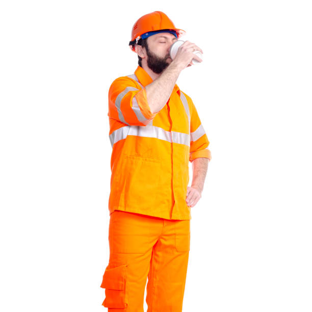 istock Man worker road constructor relax, drink cup of coffee 1138846038