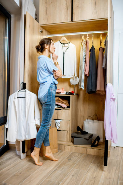 istock Woman choosing clothes in the wardrobe 1138846198