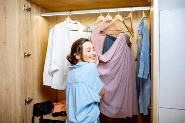 Woman choosing clothes in the wardrobe