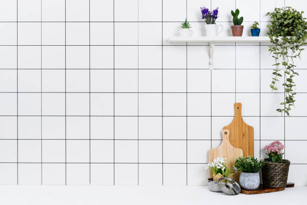istock Various kinds of kitchen tools arranged on the white table. 1138847602