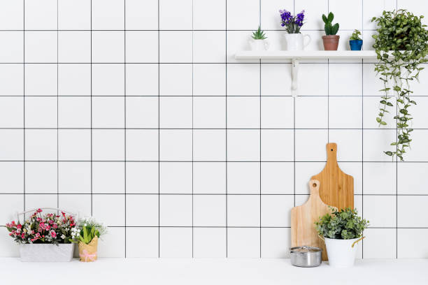 istock Various kinds of kitchen tools arranged on the white table. 1138847658
