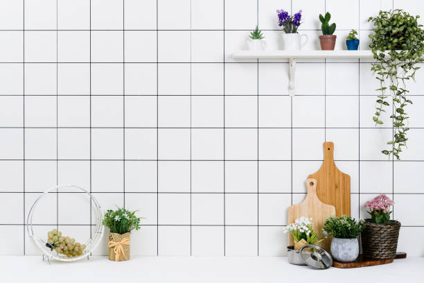 istock Various kinds of kitchen tools arranged on the white table. 1138847673