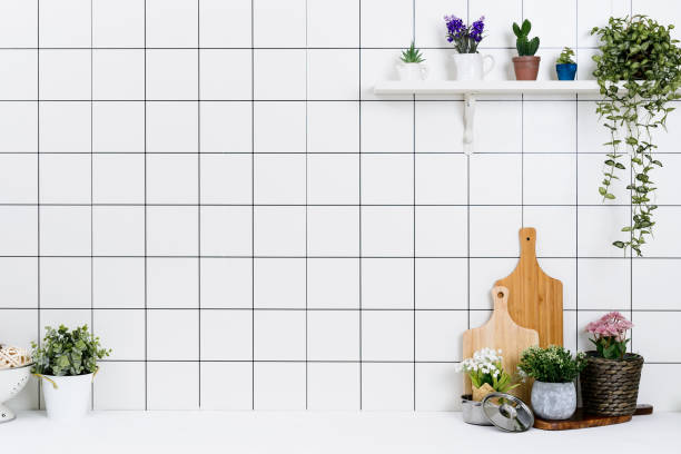 istock Various kinds of kitchen tools arranged on the white table. 1138847674