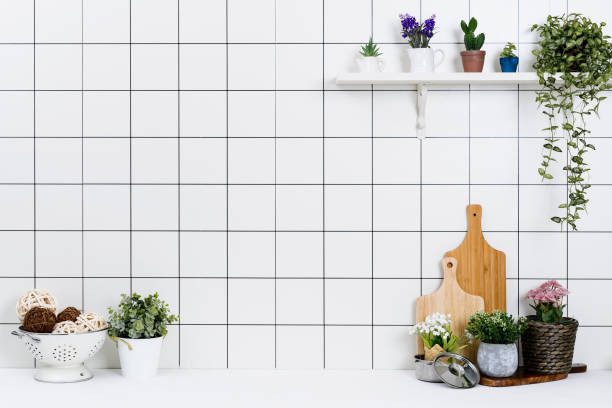 istock Various kinds of kitchen tools arranged on the white table. 1138847707