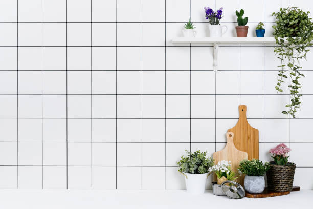 istock Various kinds of kitchen tools arranged on the white table. 1138847715