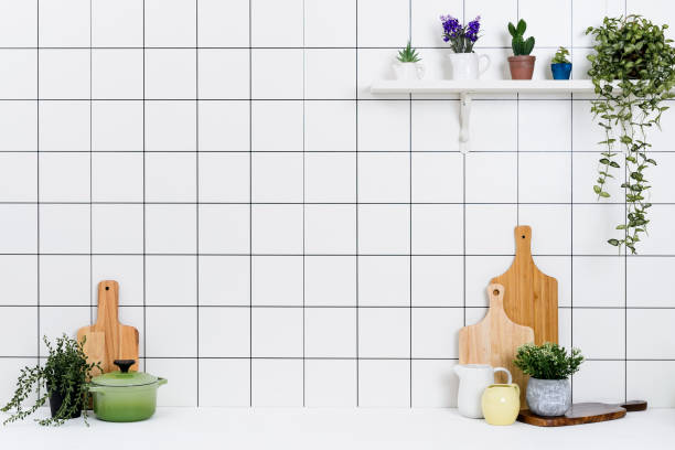 istock Various kinds of kitchen tools arranged on the white table. 1138847735