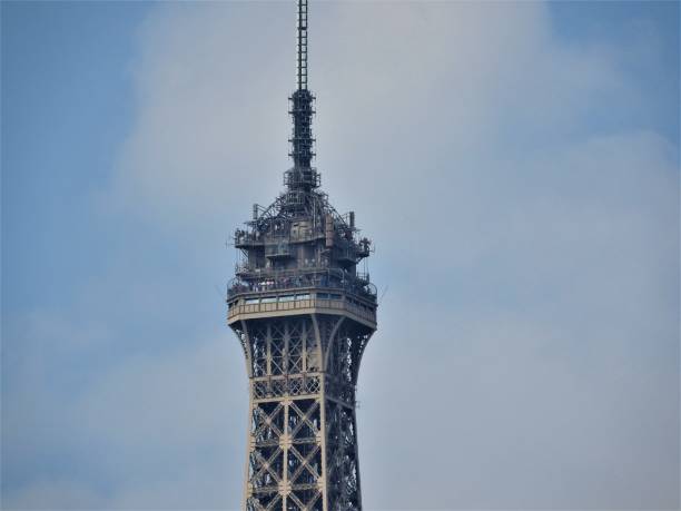 istock Elements of the Eiffel tower in Paris against a blue clear sky 1138848013
