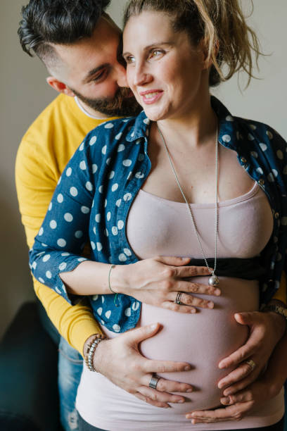 istock Future parents couple together at home 1138849069