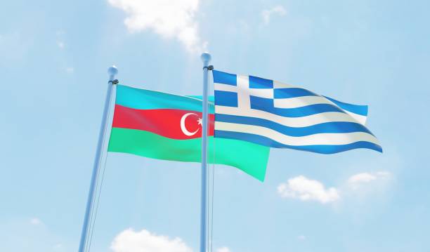 istock Greece and Azerbaijan, two flags waving against blue sky 1138849572