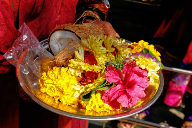 istock flower and coco religious offering on a plate 1138849644