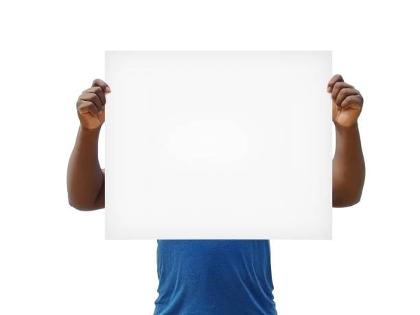 istock African man holding blank banner sign on a white background 1138849651